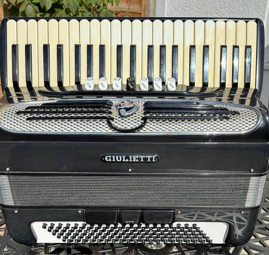 Used black Giulietti Classic 47 four voice 120 bass piano accordion front