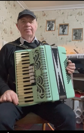 playing accordion sat down