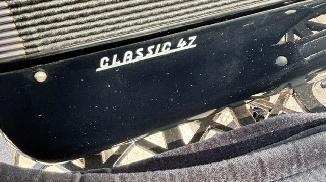 Used black Giulietti Classic 47 four voice 120 bass piano accordion model