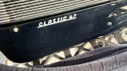 Used black Giulietti Classic 47 four voice 120 bass piano accordion model