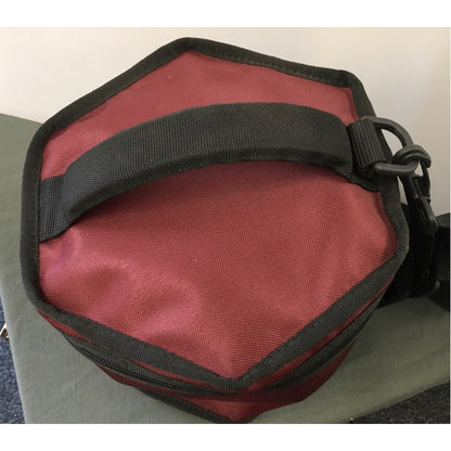 burgundy concertina gig bag showing handle to carry it