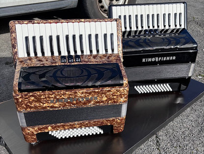 king fisher piano accordion shows 2 gold in front and black to rear