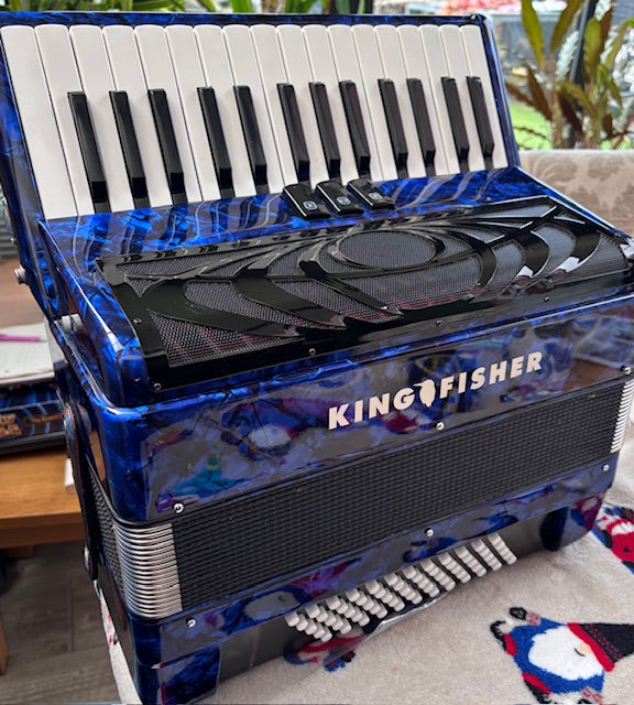 king fisher piano accordion blue facing front shows keys and bass