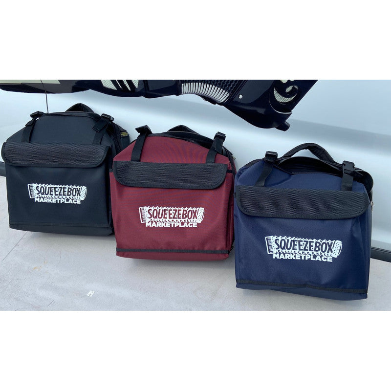 'Squeezebox Marketplace' three bags in black, red, and blue 