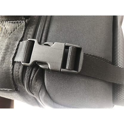 Close-up of a gray bag with a black buckle on a white background