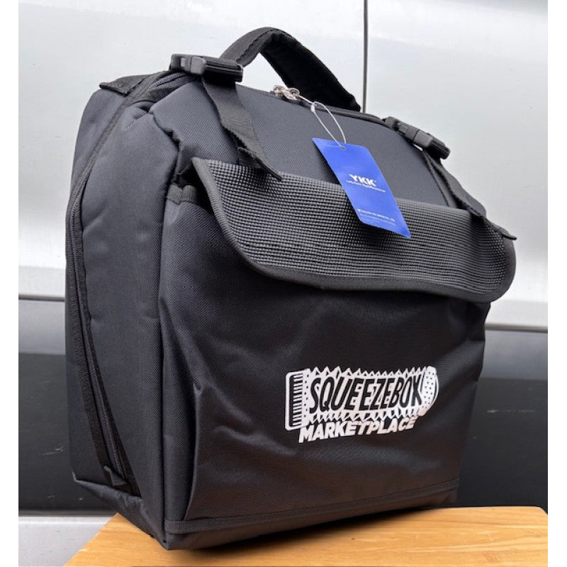 Black bag with a visible brand logo on a gray background