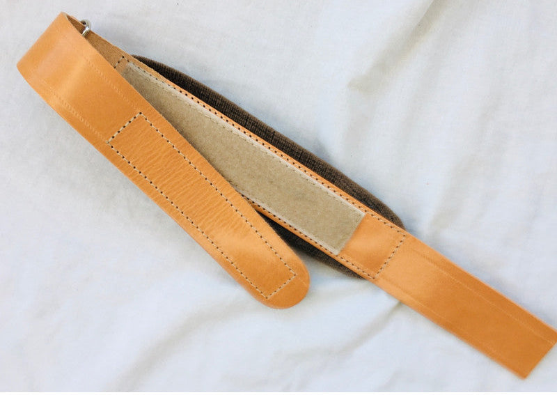 Tan melodeon bass strap padded with Velcro adjustment in genuine Italian leather shows Velcro